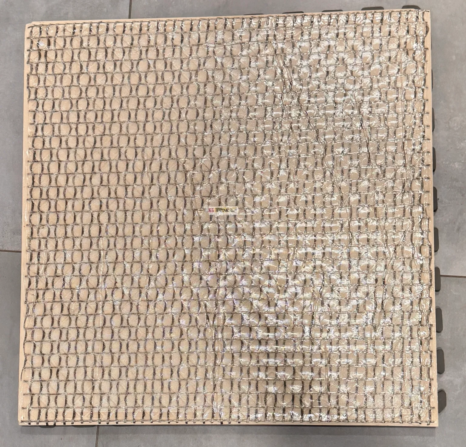 Pre-Installed Porcelain Paver Safety Backing; factory applied fall protection for porcelain pavers by skydeck usa.